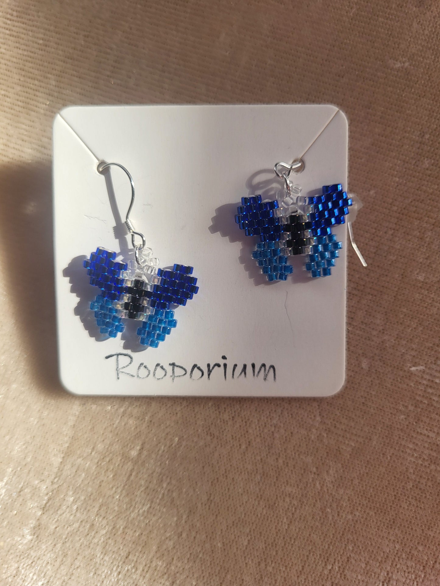 Light and dark blue butterfly earrings