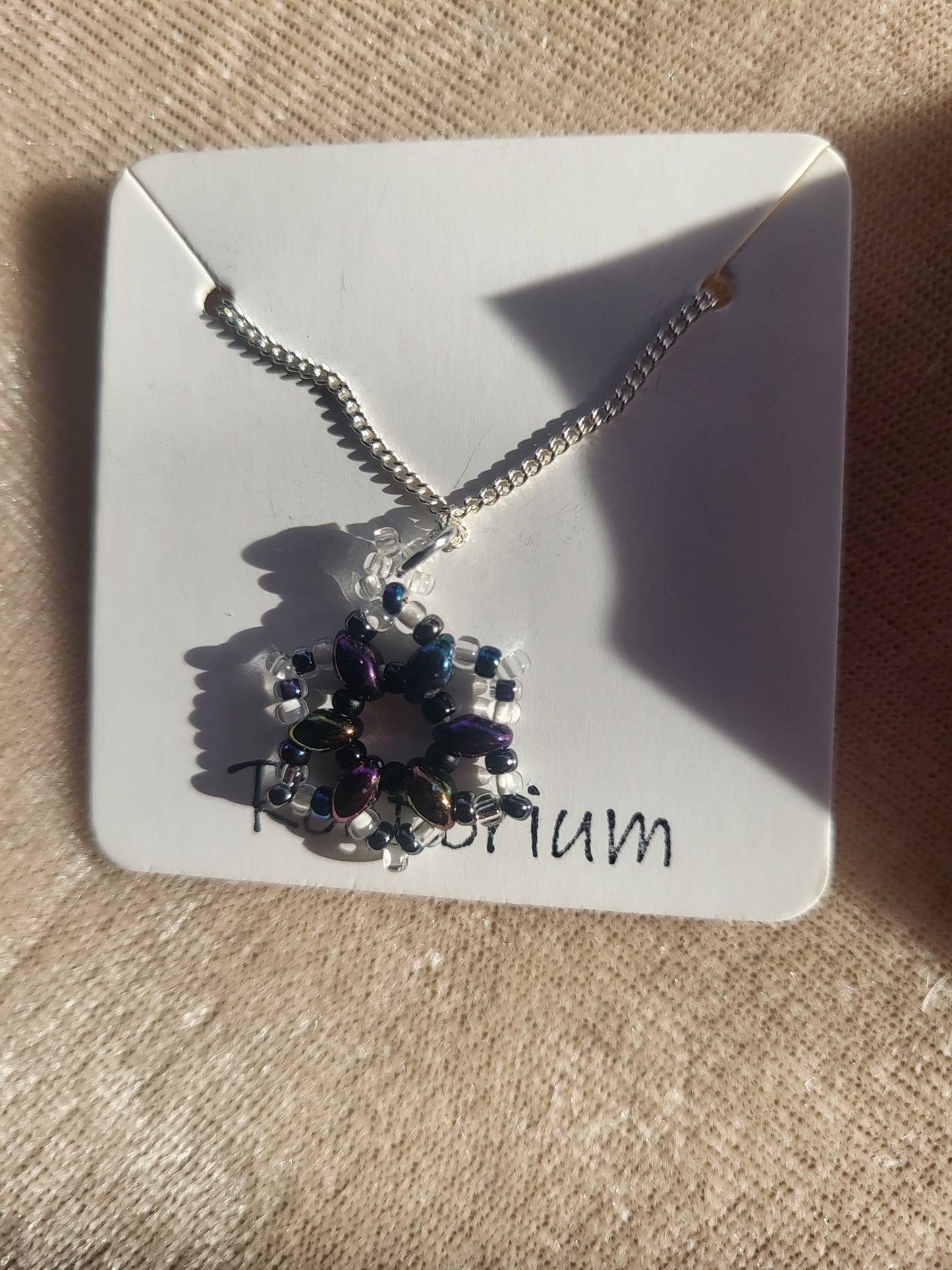 Twin bead purple white mix snowflake necklace
